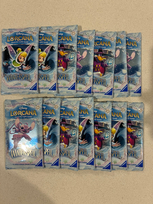 Fourteen sealed Disney Lorcana Winterspell booster packs
