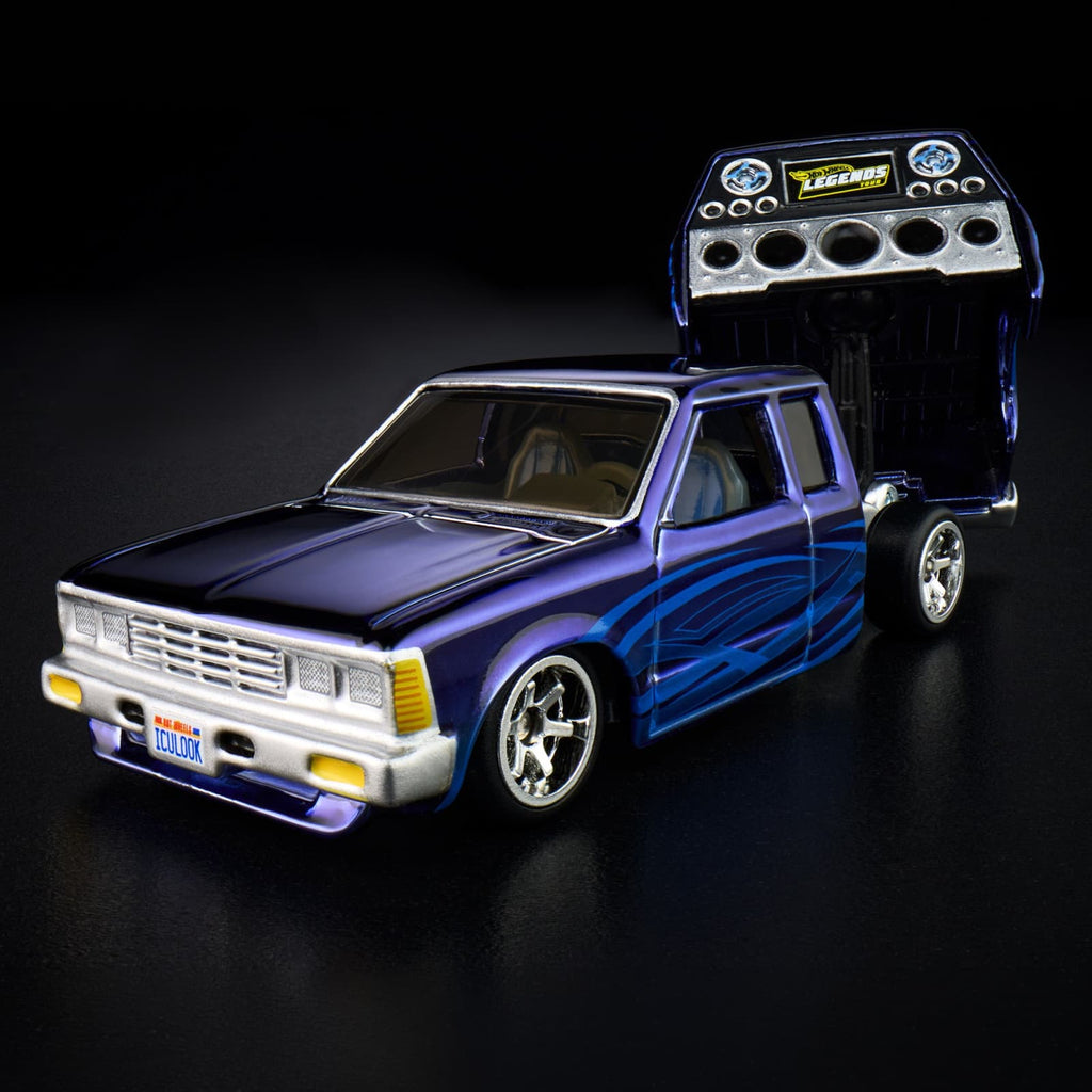 Hot Wheels RLC Nissan 720 King Cab side view with tribal graphics