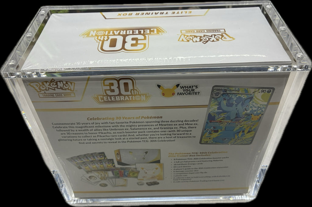 Back of the Pokémon TCG 30th Celebration Elite Trainer Box showing the printed box contents and Nidorina promo card inside the acrylic case