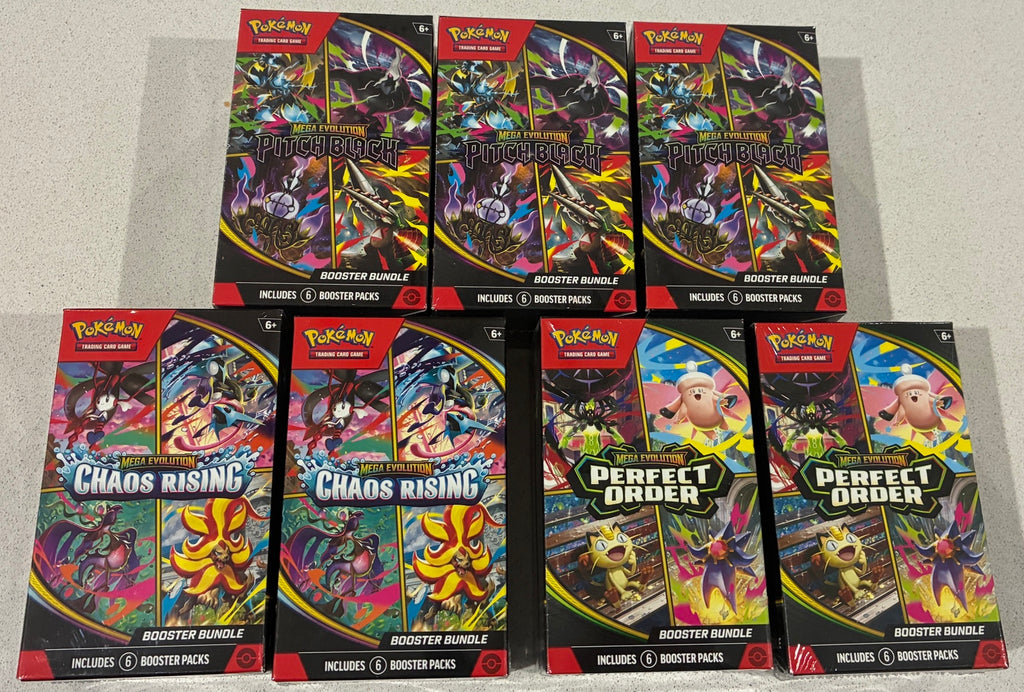 Pokemon TCG Mega Evolution booster bundle collection with Pitch Black Chaos Rising and Perfect Order